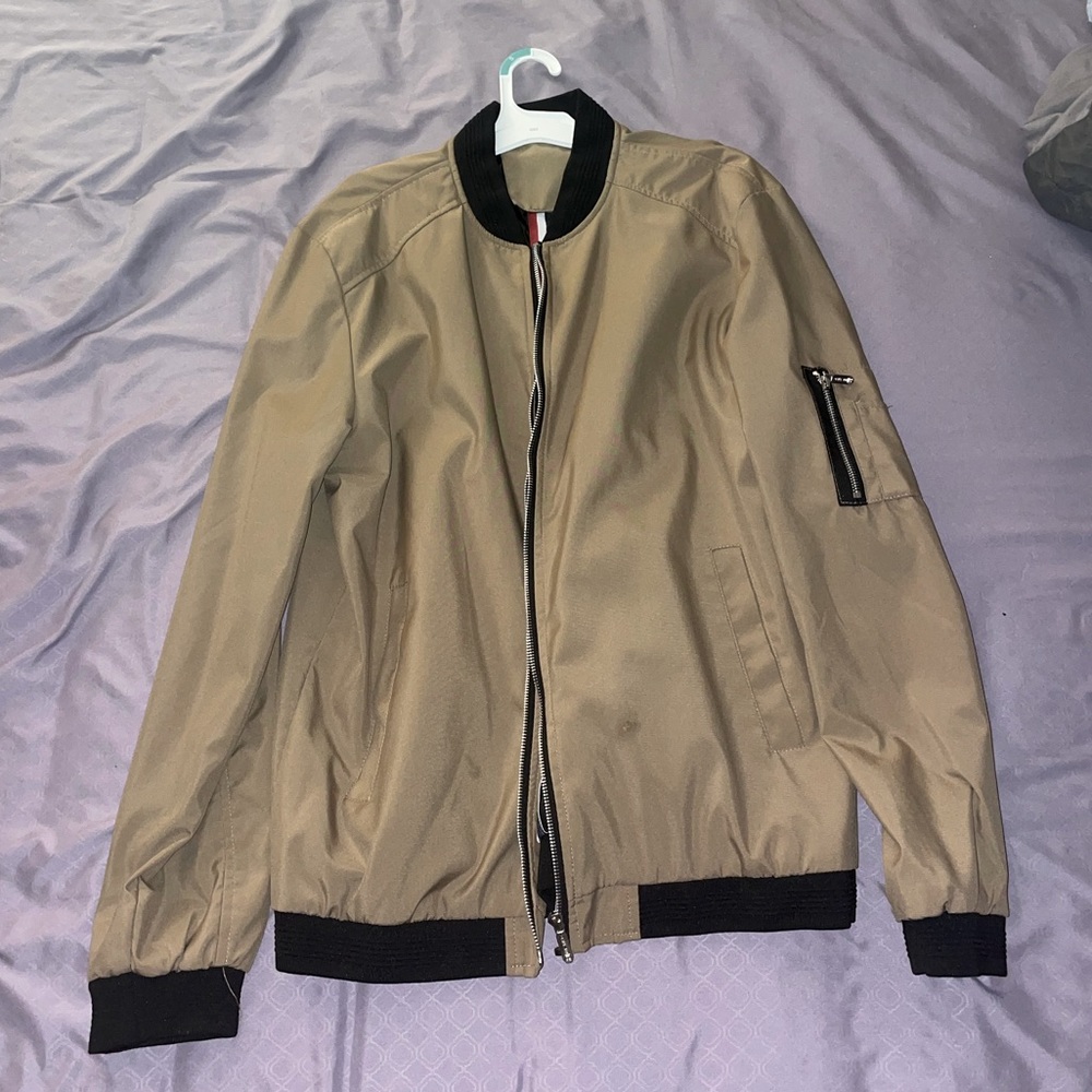 Brand new jacket. Never worn. Very comfortable and beautiful.